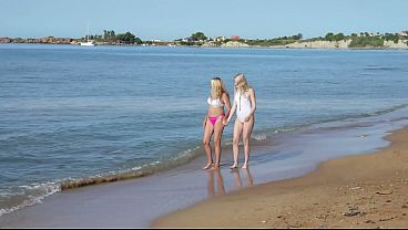 Stepmom and step daughter on a nudist beach
